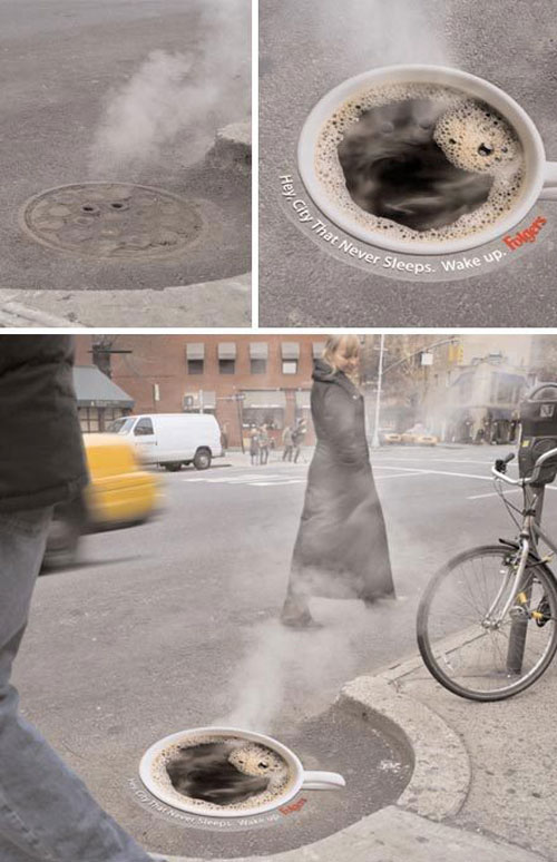 A print of a cup of Folgers coffee was placed on top of manhole covers in<br />New York City, USA. Holes on the print allows the steam to come out.<br />Wordings around the cup reads 'Hey, City That Never Sleeps. Wake up.&amp;quot; from<br />Folgers.